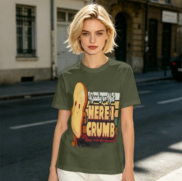 Olive graphic tee with playful bread character and 'Ready or Not Here I Crumb' text