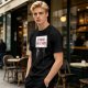 Olive t-shirt with cat holding 'It Probably Can Get Worse' sign