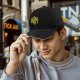 Black Baseball Cap With Distressed Yellow Skull Pirate Emblem