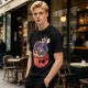 Halloween pumpkin ramen bowl with cute monster graphic t-shirt
