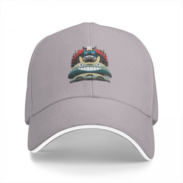 Black baseball cap with stacked Totoro characters in rainy scene