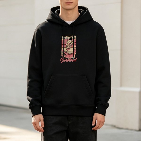 Black hoodie with retro 'We Used To Play Outside And Survived' crocodile graphic