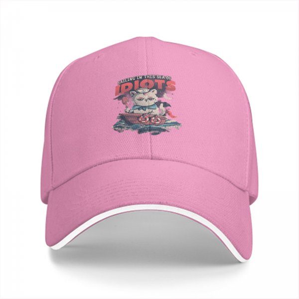 Black baseball cap with sailing cat graphic and 'Sailing in this sea of idiots' text