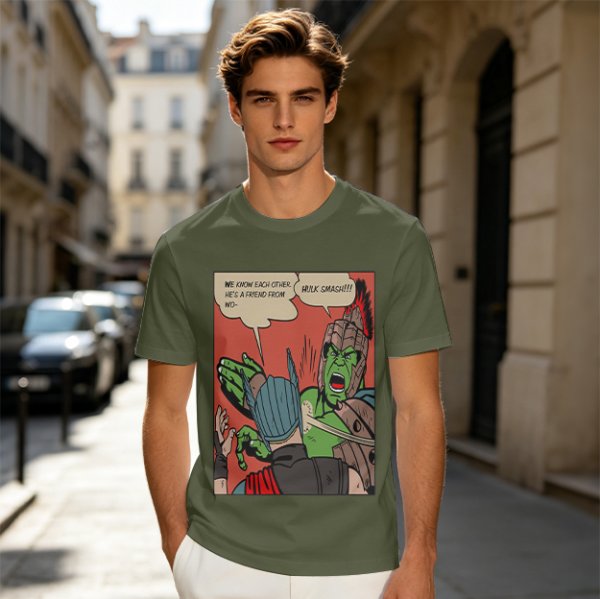 Olive t-shirt with comic print of Hulk and Thor mid-smashed interaction