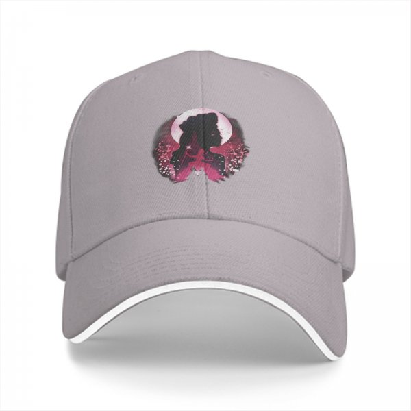 Black baseball cap with pink moon and princess silhouette graphic