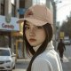 Black baseball cap with anime silhouette graphic of two characters