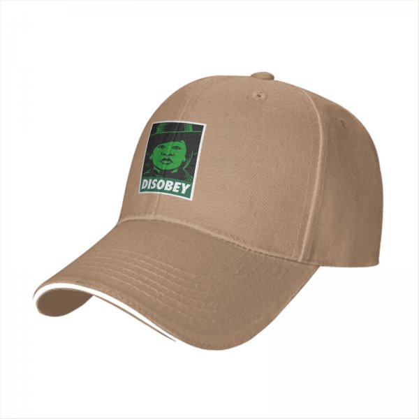 Black baseball cap with green 'DISOBEY' portrait graphic