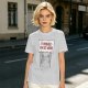 Olive t-shirt with cat holding 'It Probably Can Get Worse' sign