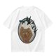 Olive T-shirt with a terrified gingerbread man and flying birds graphic