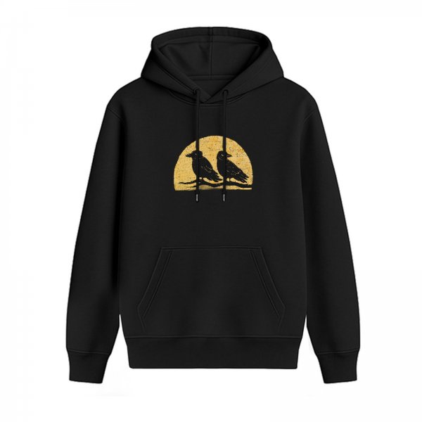 Black hoodie with two crows on branch against yellow semicircle graphic