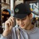 Black baseball cap with Attack on Titan anime graphic print