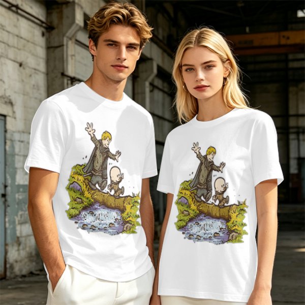 Olive T-shirt with fantasy characters balancing on a log over a stream