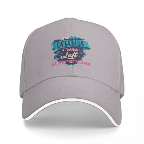 Black baseball cap with 'In My Defense I Was Left Unsupervised' print