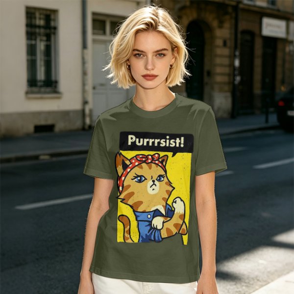 Olive green t-shirt with a cat in a Rosie the Riveter pose and 'Purrrsist!' text