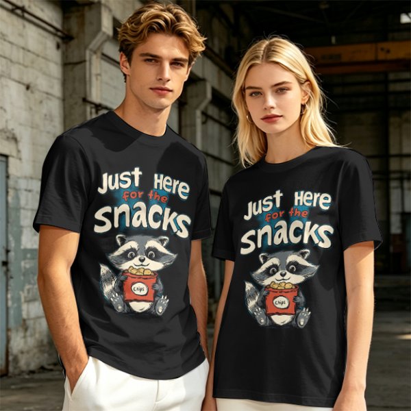 Olive green t-shirt with 'Just Here for the Snacks' and raccoon graphic