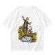 Olive T-shirt with fantasy characters balancing on a log over a stream
