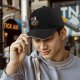Black baseball cap with 'Enjoy Your Monday' grim reaper coffee graphic
