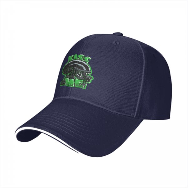 Black baseball cap with alien graphic and 'Kiss Me' text