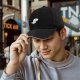 Black Baseball Cap With Cute Running T-Rex Dinosaur Graphic