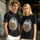 Olive T-shirt with a terrified gingerbread man and flying birds graphic