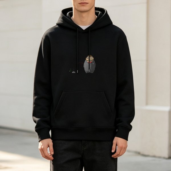 Black hoodie with cartoon chubby suited character graphic