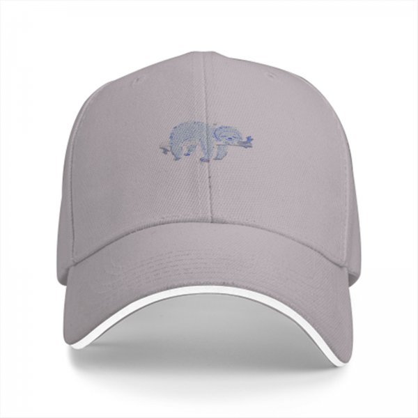 Black baseball cap with embroidered sloth holding a branch