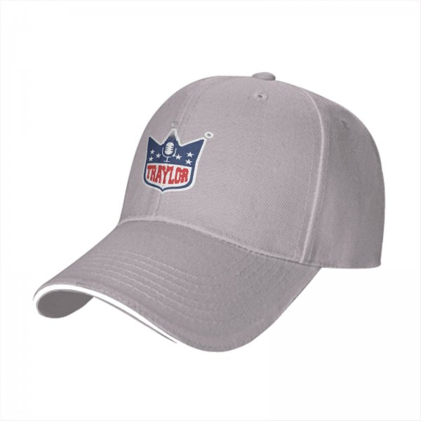 Black baseball cap with TRAYLOR crown shield logo and microphone design