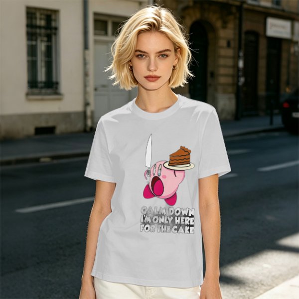 Olive t-shirt with Kirby holding knife and cake, text Calm Down I'm Only Here For The Cake