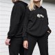 Black hoodie with tired lying cartoon figure print