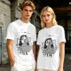 Olive green graphic t-shirt with bedridden cartoon girl and 'DAILY' text