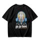 Olive green t-shirt with Appa graphic and 'yip yip travel' text