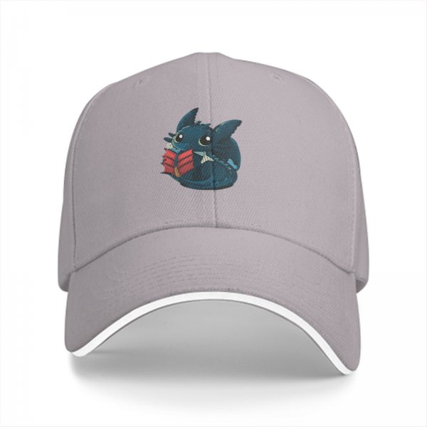 Black baseball cap with cute dragon reading a book graphic