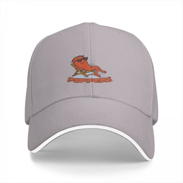 Black baseball cap with a relaxed cartoon pepper graphic and text