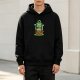 Black hoodie with whimsical green forest creature graphic