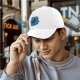 Black Baseball Cap With Playful Black Cat On Blue Abstract Background