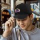 Black baseball cap with Toothless dragon and moon graphic