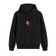 Black hoodie with small cartoon cat graphic on chest