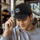 Black baseball cap with Totoro rainy forest graphic print