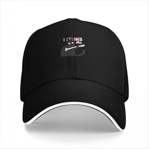 Black baseball cap with a cat holding a bone graphic and text