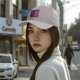 Black baseball cap with pink and purple bear graphic print