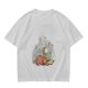 Olive green t-shirt with whimsical elf and dog artwork