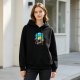 Black hoodie with vibrant anime-style nature scene graphic print