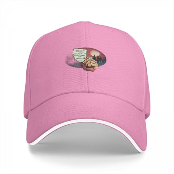Black baseball cap with hand holding paper over red moon forest print