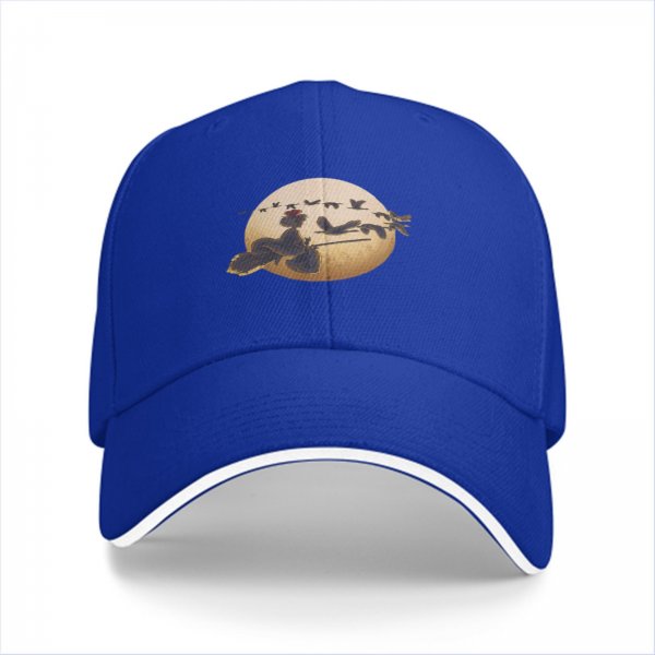 Black baseball cap with witch on broom silhouette against moon and birds