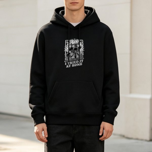 Black hoodie with 'I Tried It At Home' mad scientist bear graphic