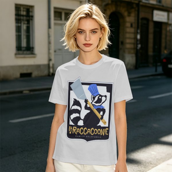 Olive green t-shirt with raccoon chef graphic and text