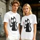 Olive T-shirt with a black cartoon cat holding a bloodied knife