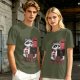 Olive graphic t-shirt with a tired raccoon office worker and 'I Just Work Here' text