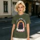Olive graphic tee with black cat, rainbow, and 'Therapy Is Not Enough' text