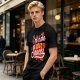 Olive green graphic tee with 'I'm here for the snacks' print